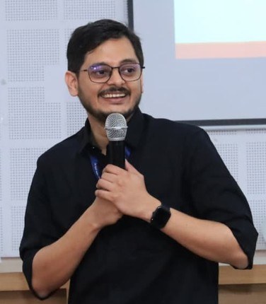 Anoop P A speaking at a training session